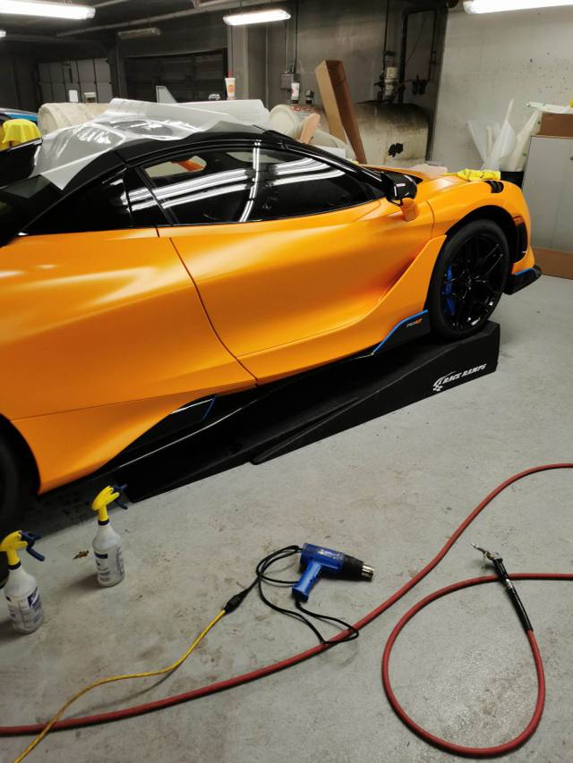 Orange McLaren 765LT mid-wrap